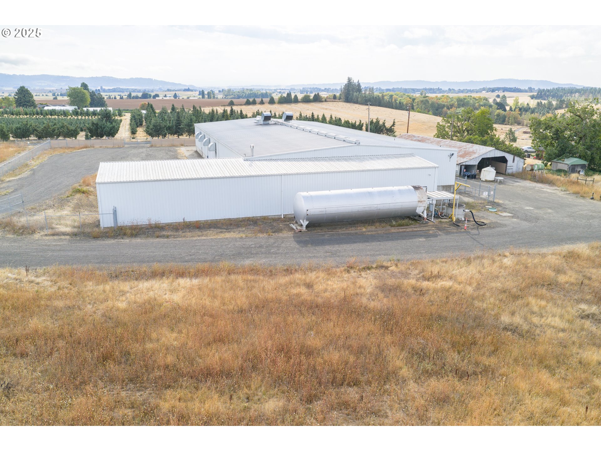 595 North Fir Villa Road Dallas, OR 97338 - Photo 6 of 37 a view of a terrace with yard and mountain view in back