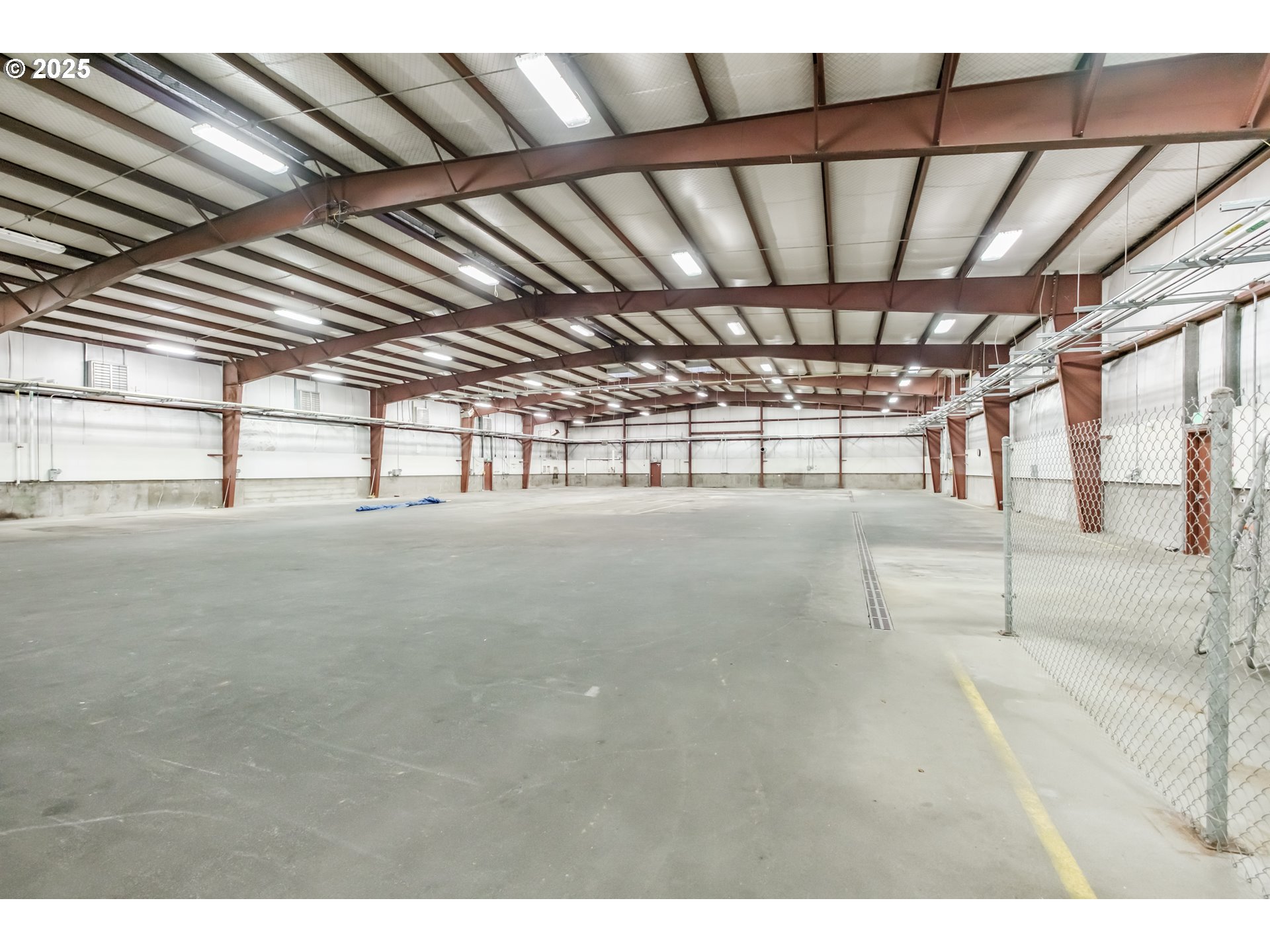 595 North Fir Villa Road Dallas, OR 97338 - Photo 10 of 37 a view of a water heater room with a garage