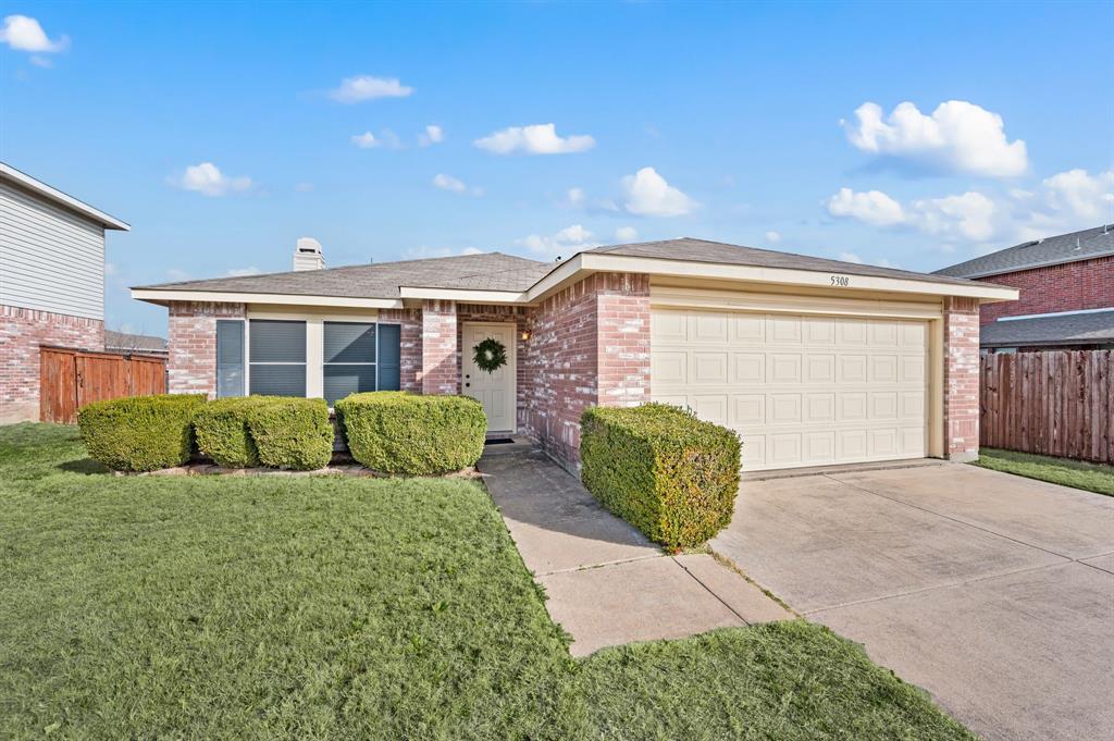 5308 Temecula Road Fort Worth, TX 76244 - Photo 1 of 37 a front view of a house with garden