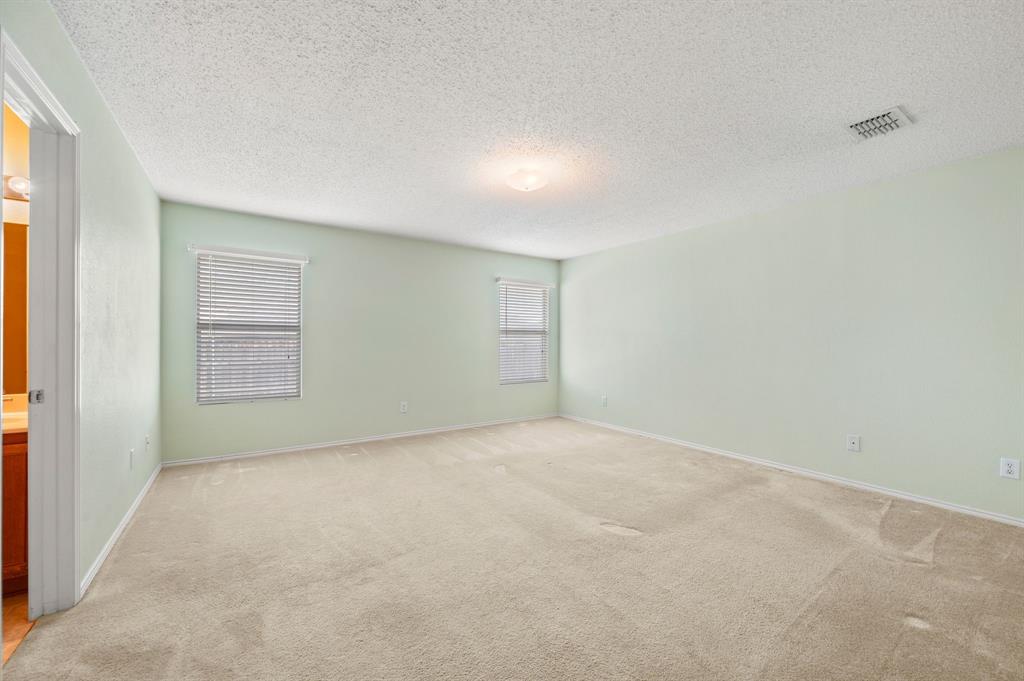 5308 Temecula Road Fort Worth, TX 76244 - Photo 22 of 37 a view of an empty room with a window