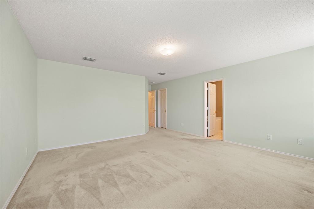 5308 Temecula Road Fort Worth, TX 76244 - Photo 23 of 37 a view of an empty room with a window