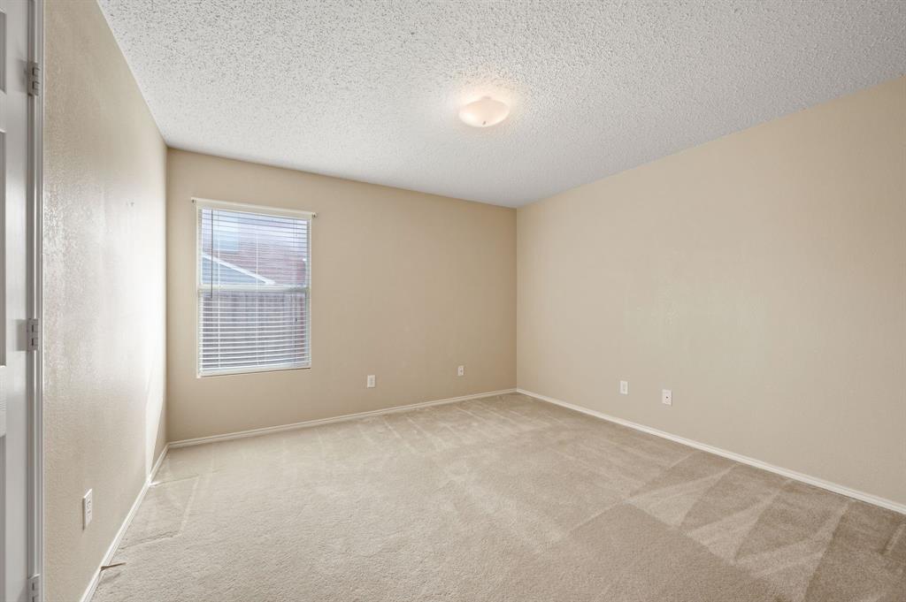 5308 Temecula Road Fort Worth, TX 76244 - Photo 28 of 37 a view of an empty room with a window