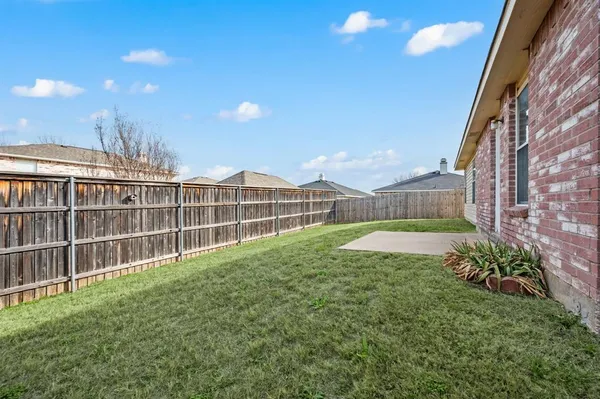 a view of a backyard with a garden