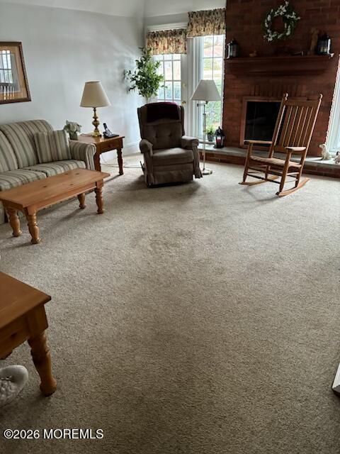 16 Cherry Court Spring Lake Heights, NJ 07762 - Photo 6 of 15 a living room with furniture and a fireplace