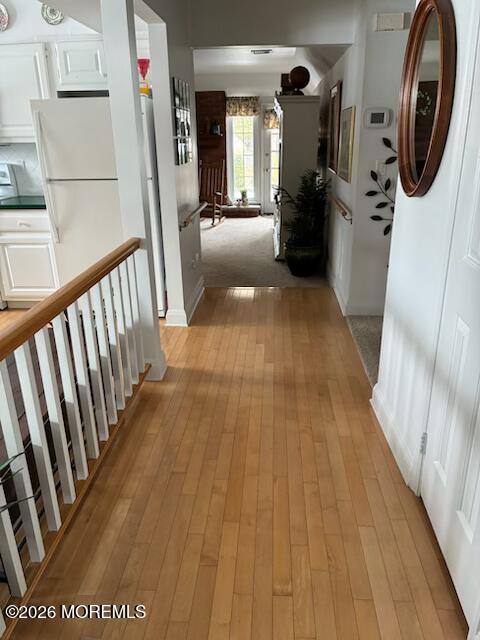 16 Cherry Court Spring Lake Heights, NJ 07762 - Photo 7 of 15 a view of a hallway with washer and dryer