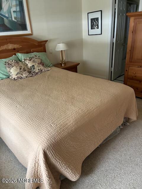 16 Cherry Court Spring Lake Heights, NJ 07762 - Photo 10 of 15 a bedroom with a bed and painting on the wall