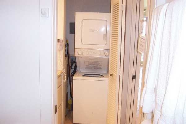 2253 Poipu Road, Unit 28 Koloa, HI 96756 - Photo 10 of 12 a utility room with dryer and washer