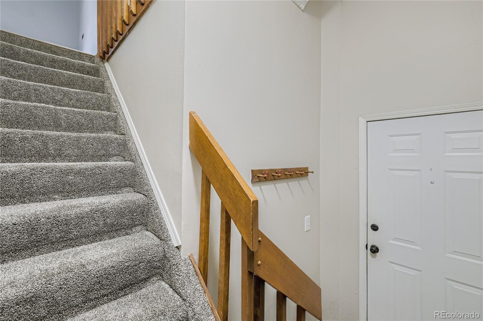 2129 Troy Court Colorado Springs, CO 80918 - Photo 25 of 27 a view of staircase with white walls