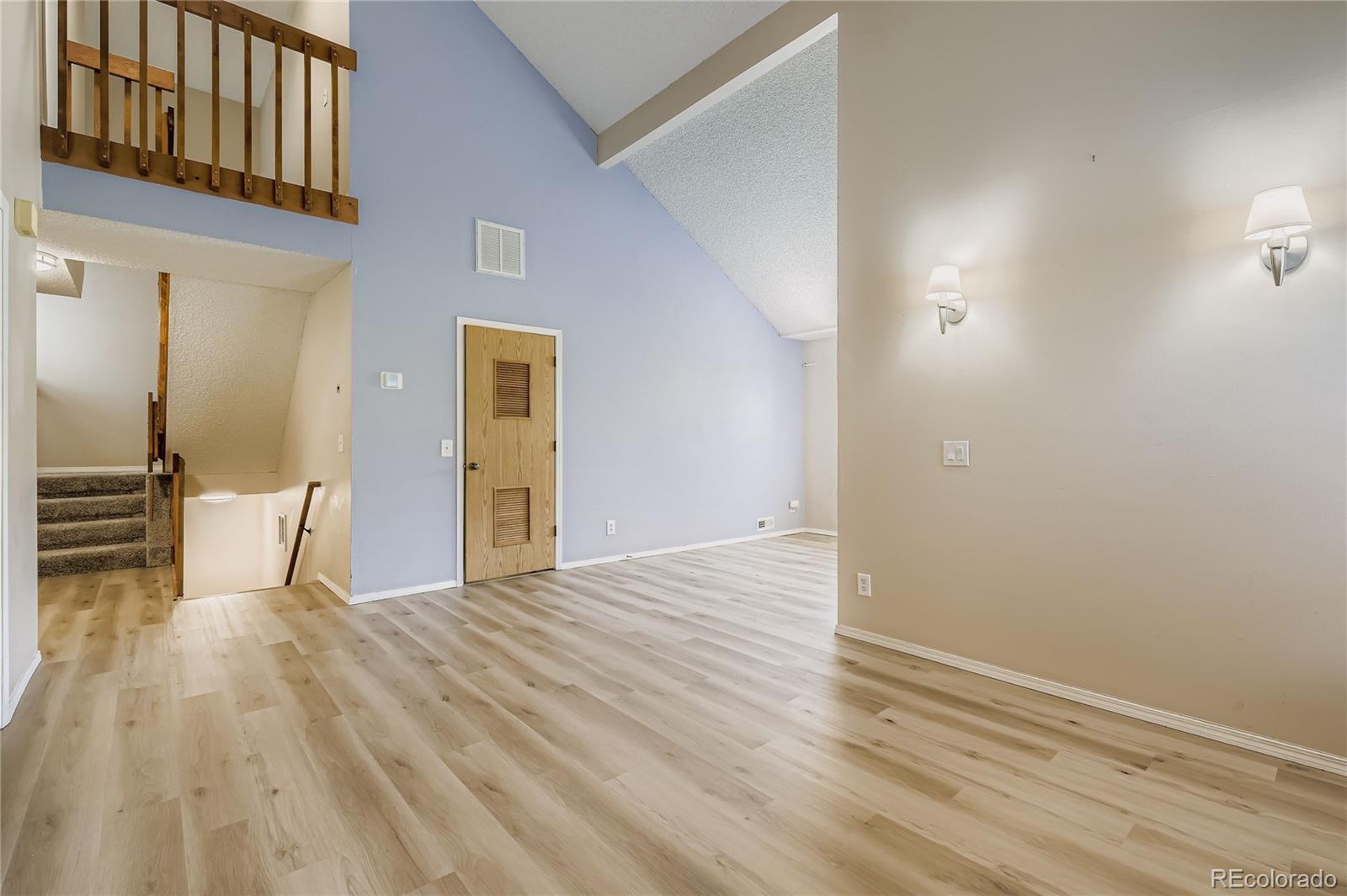 2129 Troy Court Colorado Springs, CO 80918 - Photo 10 of 27 a view of empty room with wooden floor