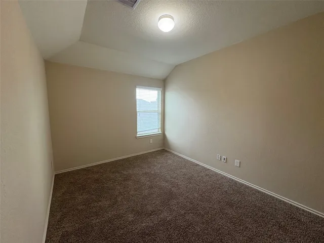 a bathroom with a sink double vanity and a mirror