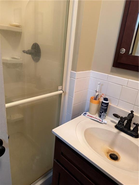 828 Brownhome Road New Castle, PA 16101 - Photo 21 of 47 a bathroom with a sink and a mirror