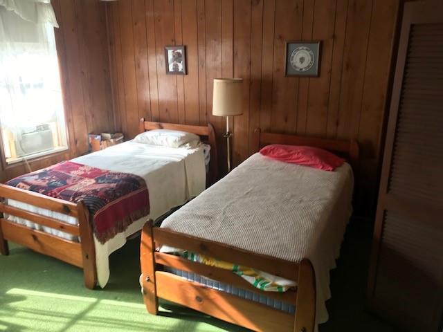 828 Brownhome Road New Castle, PA 16101 - Photo 28 of 47 a bed sitting in a bedroom next to a window