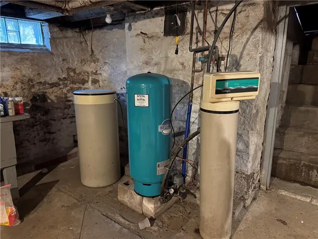 a view of a pool in the backyard of house