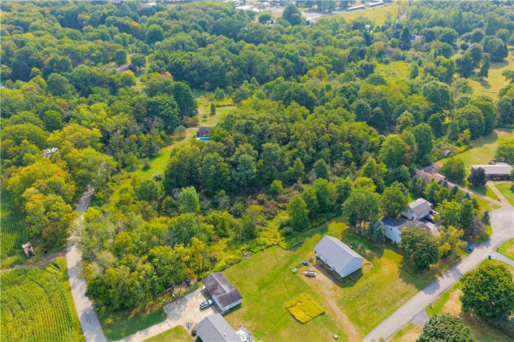 828 Brownhome Road New Castle, PA 16101 - Photo 40 of 47 an aerial view of residential houses with yard