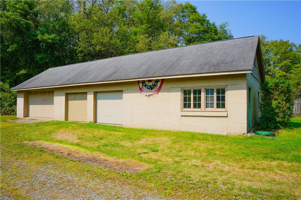 828 Brownhome Road New Castle, PA 16101 - Photo 7 of 47 a house view with a garden space