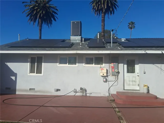 a view of a back yard of the house