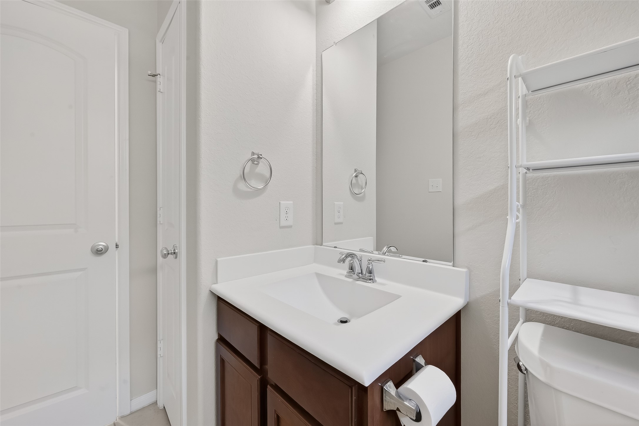 7631 Granite Terrace Lane Houston, TX 77083 - Photo 25 of 46 a bathroom with a sink toilet and vanity