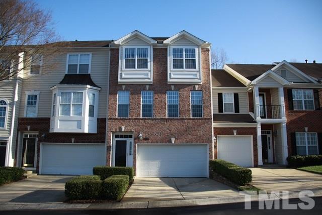 1439 Basinger Court Raleigh, NC 27612 - Photo 1 of 25 a front view of a house with a yard