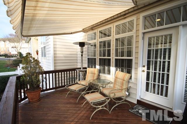 1439 Basinger Court Raleigh, NC 27612 - Photo 2 of 25 a view of a patio with a table and chairs