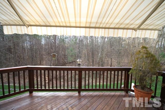 1439 Basinger Court Raleigh, NC 27612 - Photo 3 of 25 a side view of a wooden street