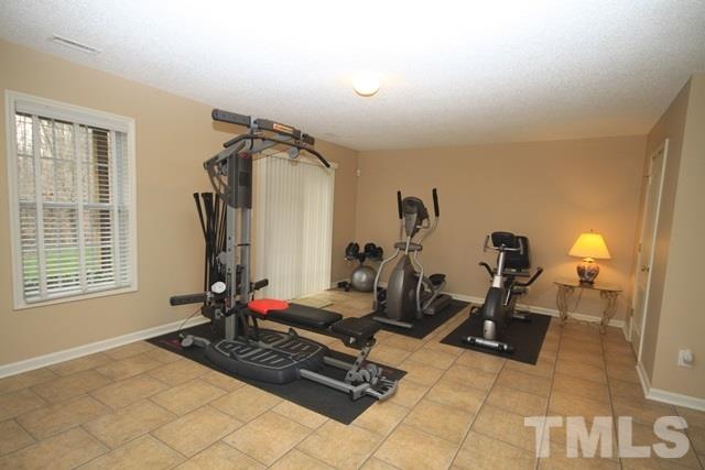 1439 Basinger Court Raleigh, NC 27612 - Photo 24 of 25 a view of a room with gym equipment
