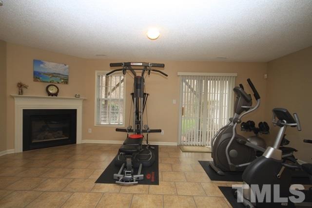 1439 Basinger Court Raleigh, NC 27612 - Photo 25 of 25 a view of a room with gym equipment