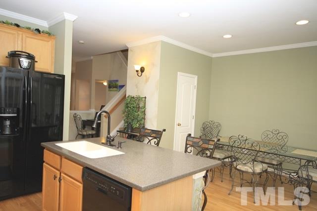 1439 Basinger Court Raleigh, NC 27612 - Photo 9 of 25 a bathroom with a sink and a mirror