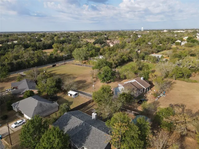 an aerial view of residential house with outdoor space