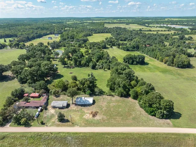 a view of a lake with outdoor space and yard