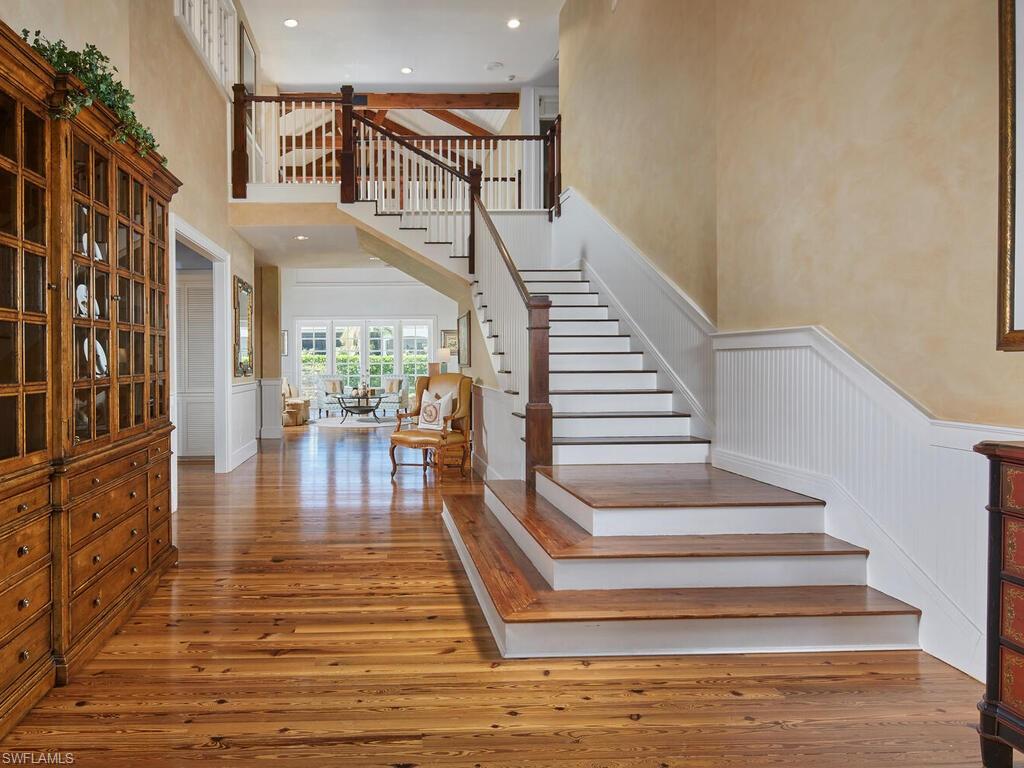 2750 Treasure Lane Naples, FL 34102 - Photo 3 of 28 a view of entryway and hall with wooden floor