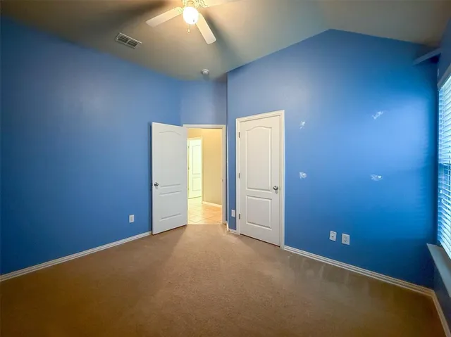 a view of a livingroom with a workspace