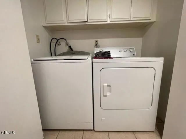 a bed room with furniture and a window