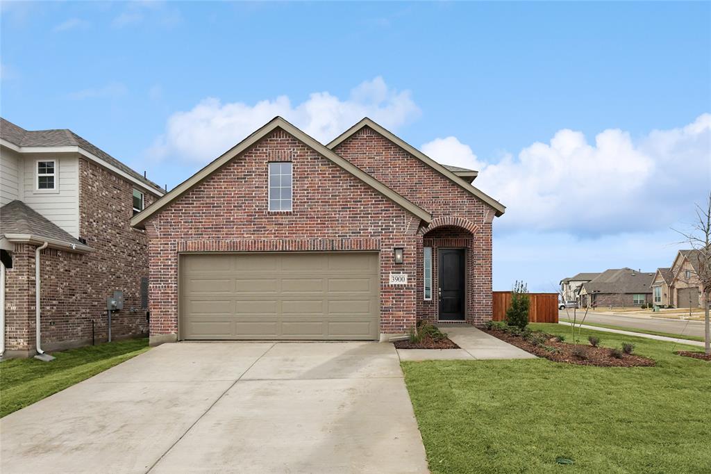 3900 Coco Lane Sherman, TX 75090 - Photo 1 of 40 View of property featuring a garage and a front yard