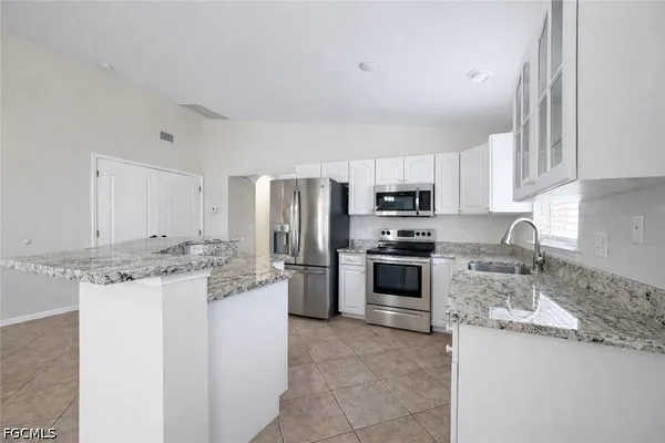 $1,595 | 2310 Northeast 8th Place, Cape Coral, FL 33909