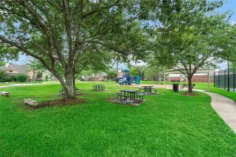 a view of a park with bench and a bench