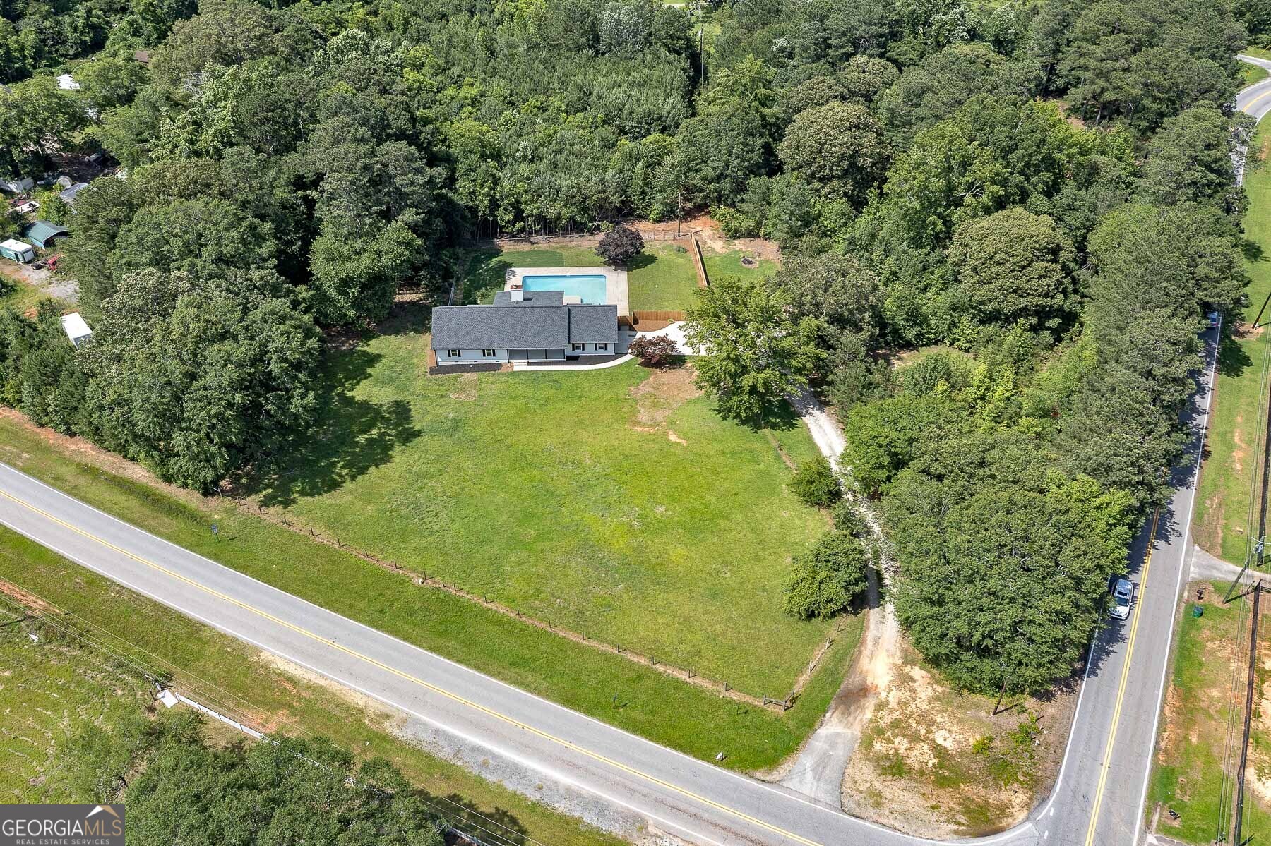 858 Pates Creek Road Stockbridge, GA 30281 - Photo 27 of 27 a view of a yard with an outdoor seating