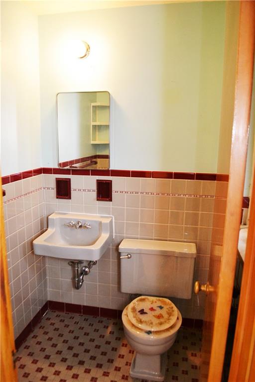 103 Lincoln Road Clairton, PA 15025 - Photo 24 of 39 a bathroom with a sink and a mirror