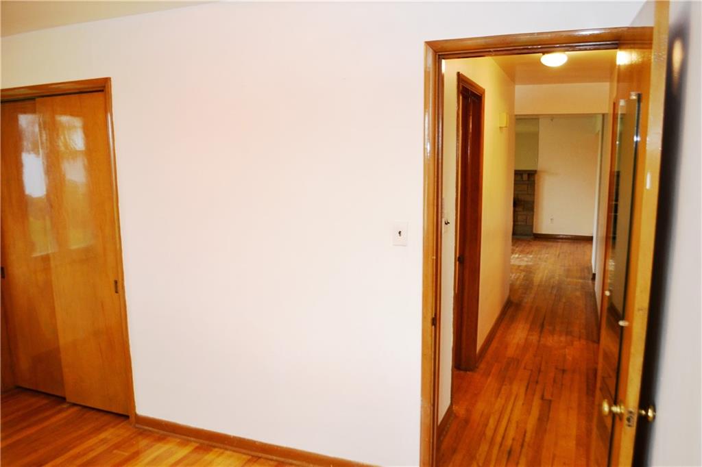 103 Lincoln Road Clairton, PA 15025 - Photo 27 of 39 a view of a hallway with wooden floor