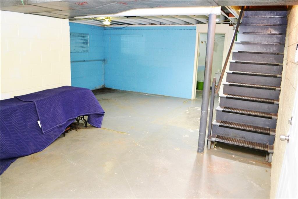 103 Lincoln Road Clairton, PA 15025 - Photo 30 of 39 a view of a room with stairs and a couch