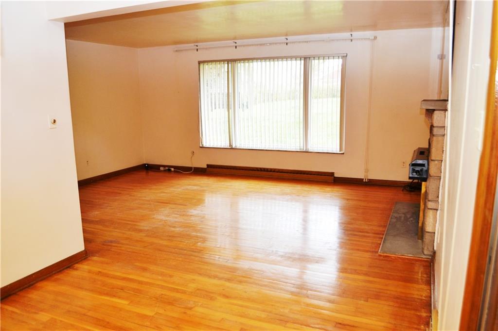 103 Lincoln Road Clairton, PA 15025 - Photo 3 of 39 a view of an empty room with window