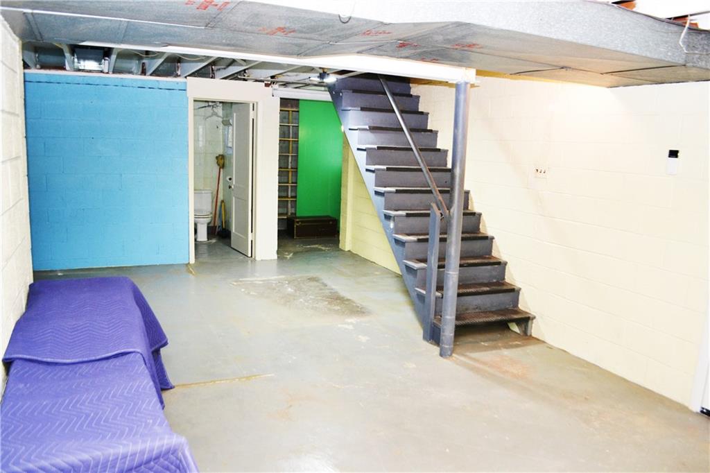 103 Lincoln Road Clairton, PA 15025 - Photo 31 of 39 a view of an empty room with stairs