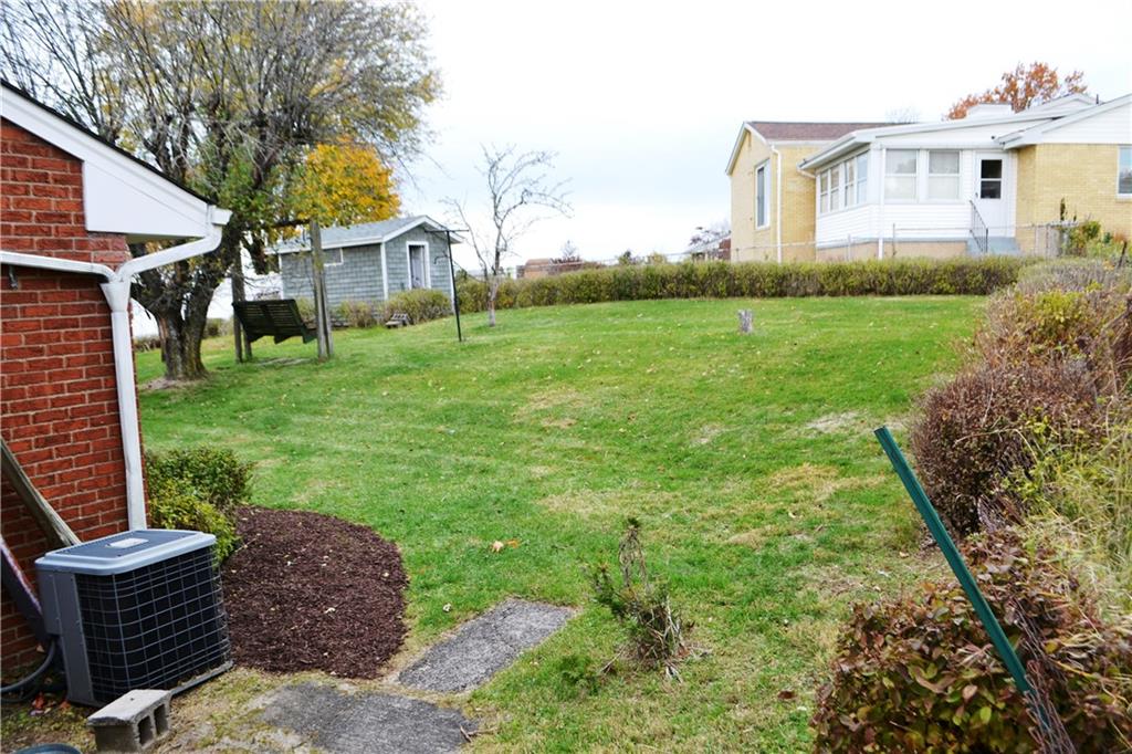 103 Lincoln Road Clairton, PA 15025 - Photo 36 of 39 a view of a house with backyard sitting area and garden