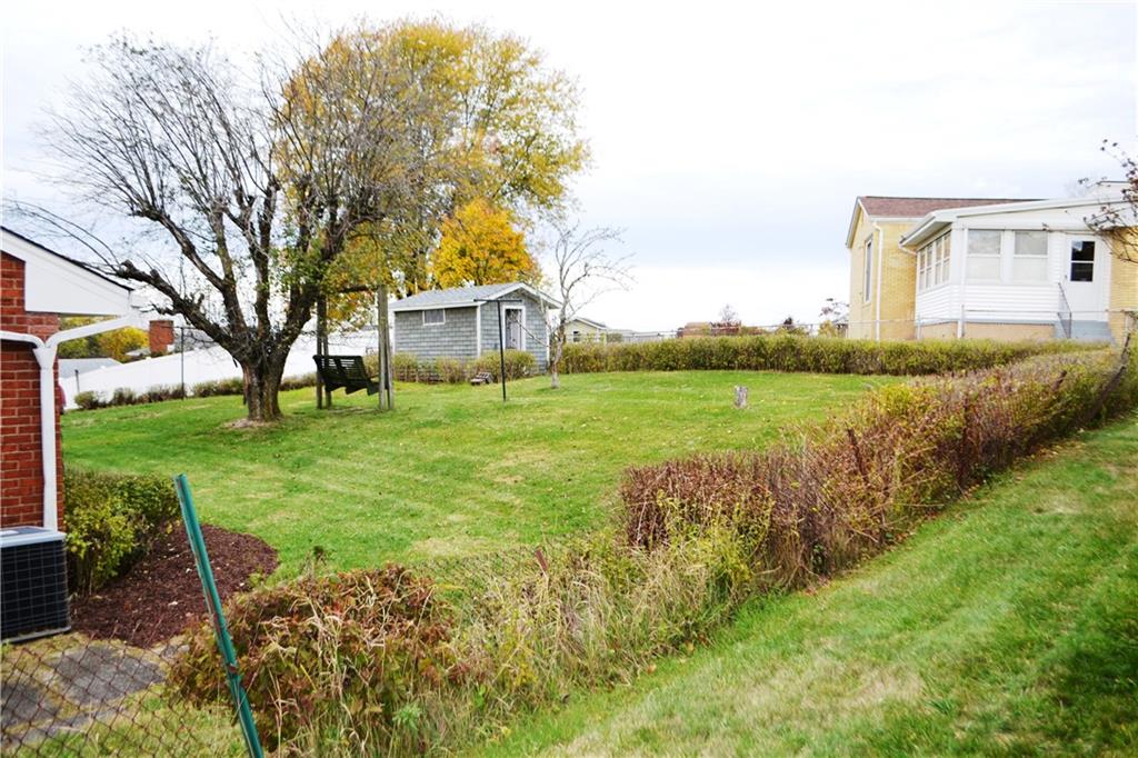 103 Lincoln Road Clairton, PA 15025 - Photo 38 of 39 a view of a house with a yard