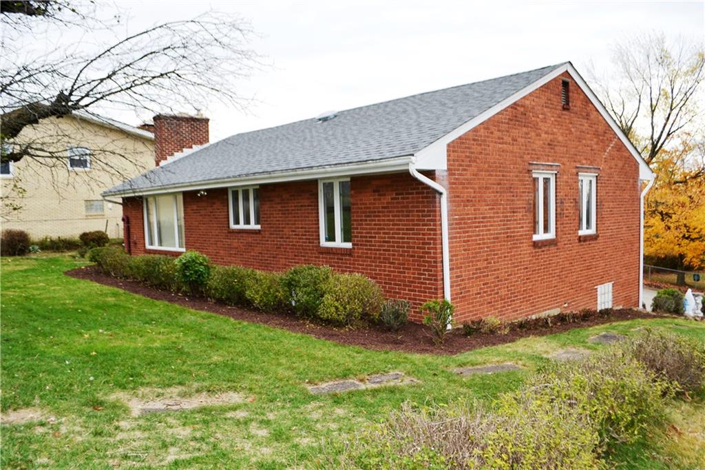 103 Lincoln Road Clairton, PA 15025 - Photo 39 of 39 a front view of a house with garden