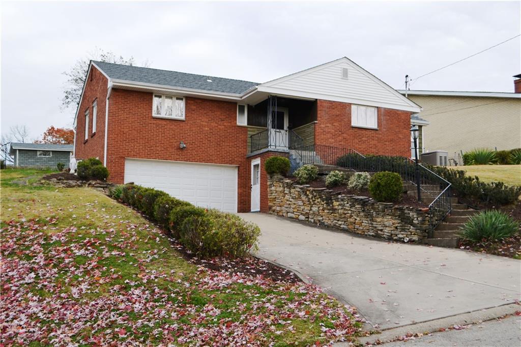 103 Lincoln Road Clairton, PA 15025 - Photo 6 of 39 a front view of a house with garden