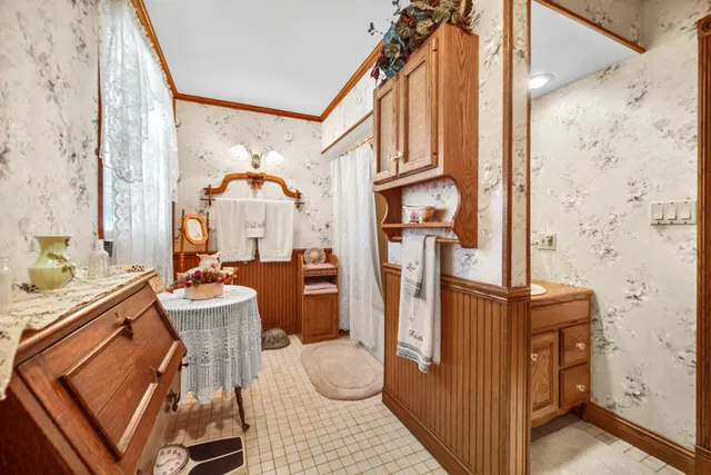 a view of living room with furniture and a window