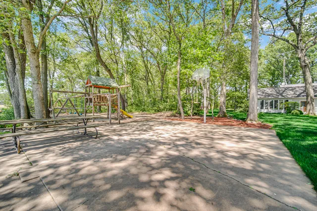 a house with trees in front of it