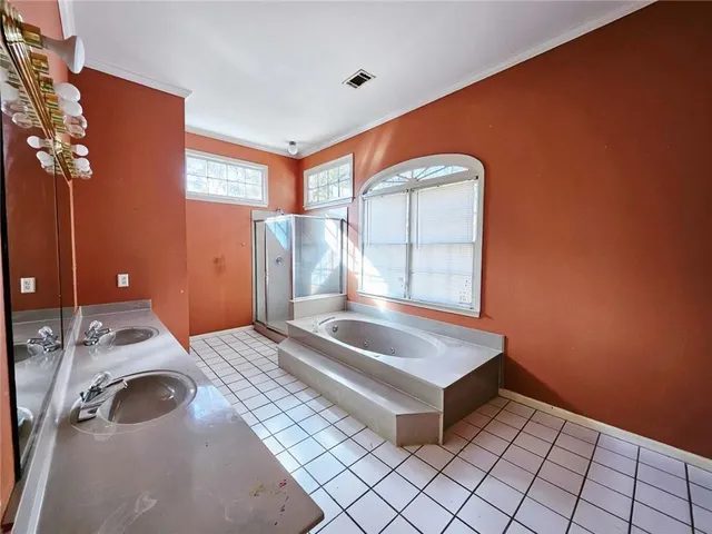 a room with a bed and a window