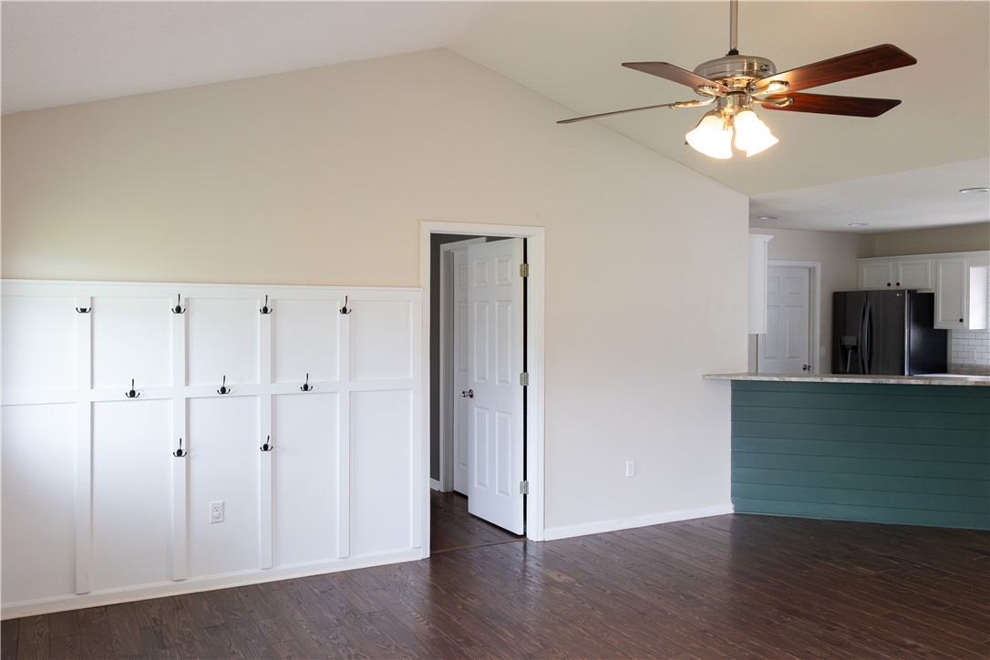 439 Chetola Road Seneca, SC 29672 - Photo 13 of 28 Vaulted ceilings and rich wood floors anchor this versatile open-concept living area.