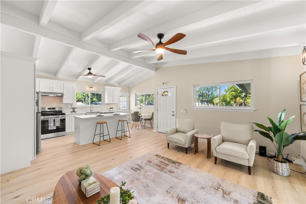 17042 Rorimer Street La Puente, CA 91744 - Photo 8 of 31 Large living room with ceiling fan.